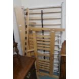An oak double bed and a metal single bed (af) Condition Report: Available upon request