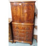 A reproduction mahogany cabinet Condition Report: Available upon request
