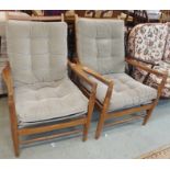 A pair of mid-Century Scandart armchairs (2) Condition Report: