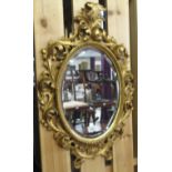 A gilt wall mirror Condition Report: Available upon request