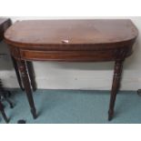 A mahogany fold-over tea table Condition Report: