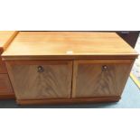 A Meredew teak two door cabinet Condition Report: Available upon request