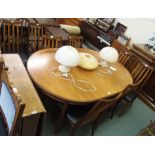 A mid-Century G-plan teak extending dining table with eight chairs (9) Condition Report: Available