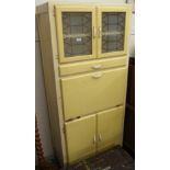 A yellow kitchen cabinet Condition Report: Available upon request