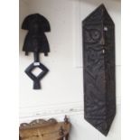 An African carved shield and carved women (2) Condition Report: Available upon request