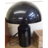A black Oluce table lamp Condition Report: