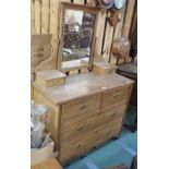 A dressing chest with mirror Condition Report: Available upon request