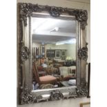 A modern ornate wall mirror Condition Report: