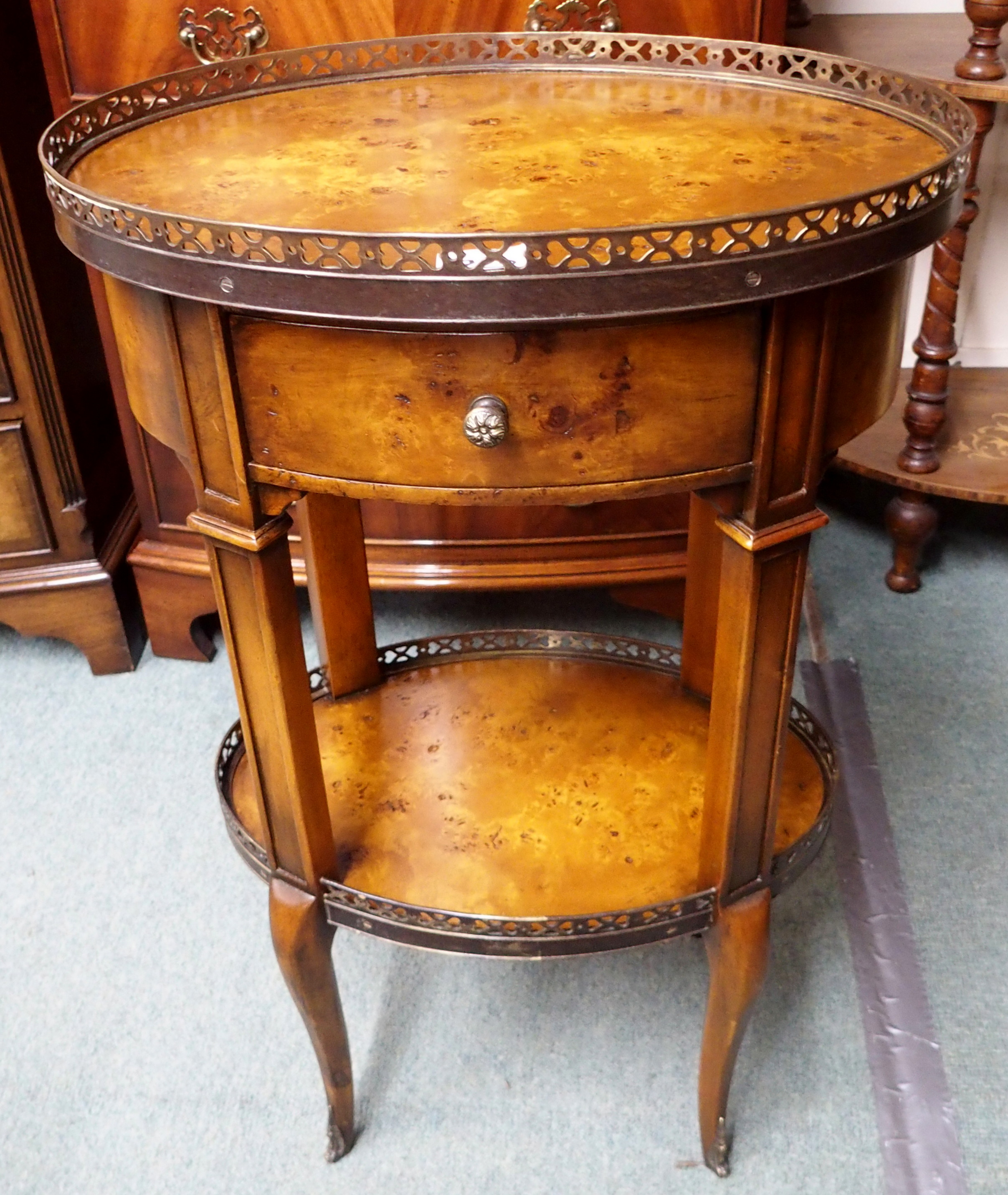 A reproduction two-tier side table and a circular hardwood occasional table (2) Condition Report: