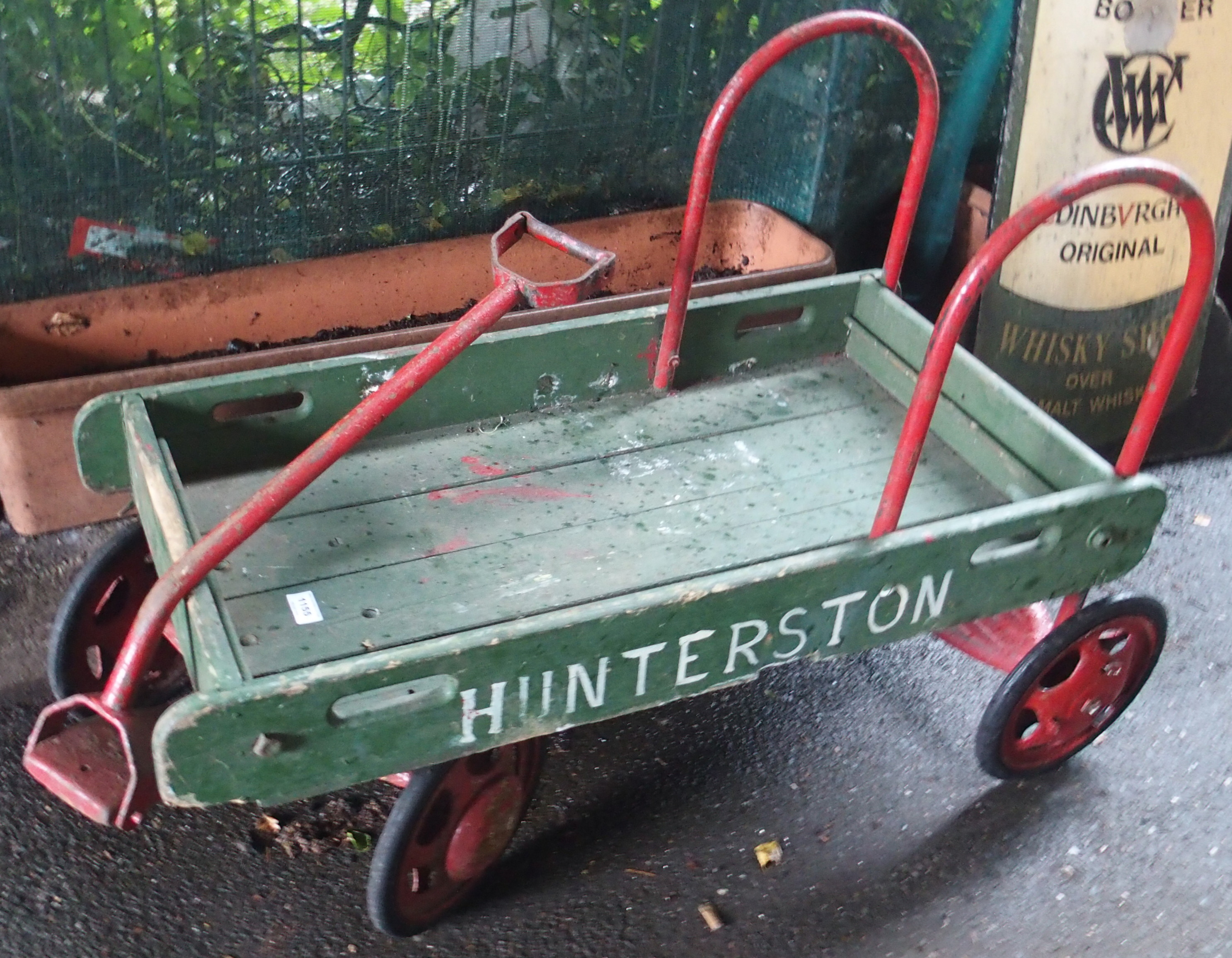 A vintage wooden hand cart (Hunterson painted on side) Condition Report: Available upon request