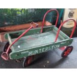 A vintage wooden hand cart (Hunterson painted on side) Condition Report: Available upon request