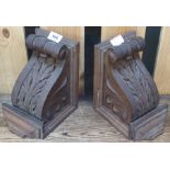 A pair of carved oak wall brackets (2) Condition Report: