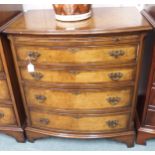 A walnut four drawer bow front chest Condition Report: Available upon request