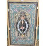 A leaded and stained glass panel, 86cm high x 52cm wide Condition Report: