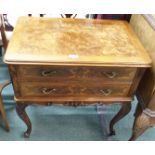 A reproduction walnut two drawer chest on legs Condition Report: Available upon request