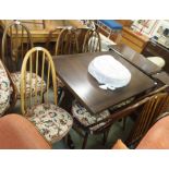An Ercol dining table with five dining chairs and a light Ercol dining chair (7) Condition Report: