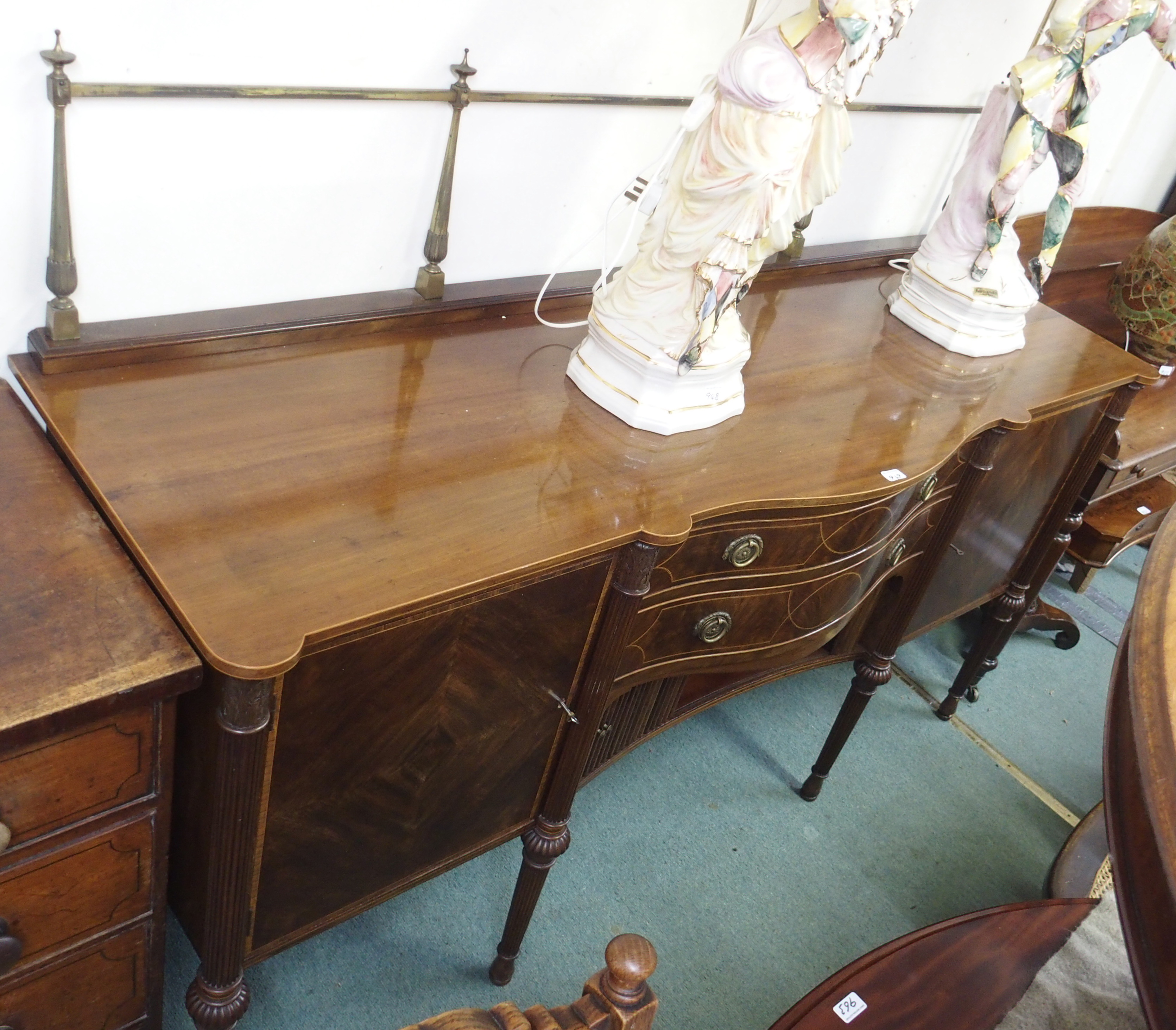 A Georgian style mahogany sideboard with brass rail Condition Report: Available upon request