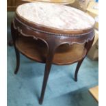 A circular marble topped window table Condition Report: Available upon request