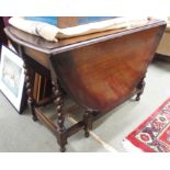 An oak gateleg table Condition Report: Available upon request