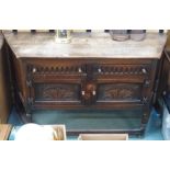 A carved oak sideboard Condition Report: Available upon request