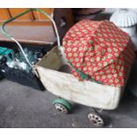 A vintage dolls pram Condition Report: Available upon request