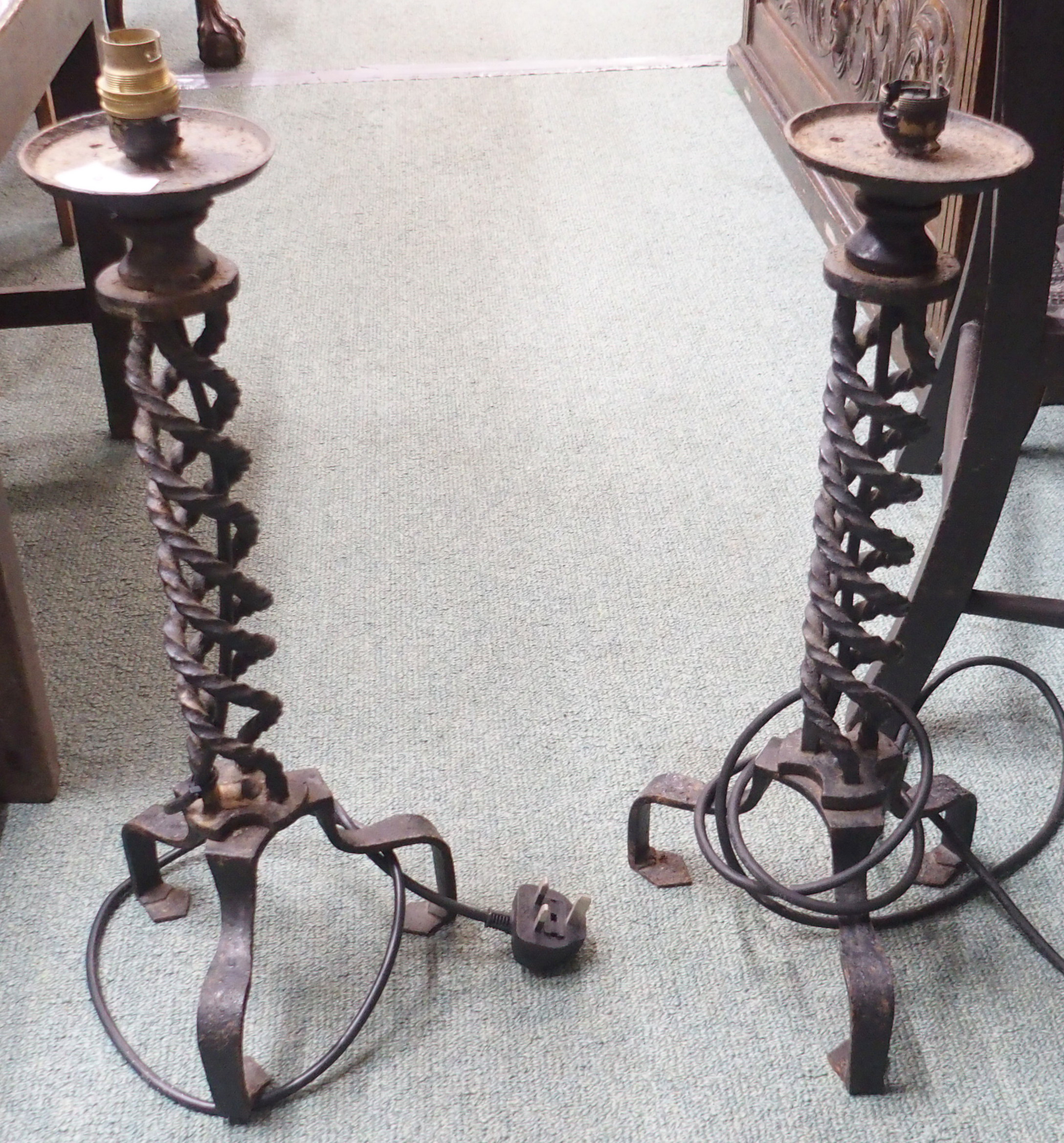 A pair of wrought iron table lamps (2) Condition Report: