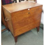 A lidded teak chest on legs Condition Report: Available upon request