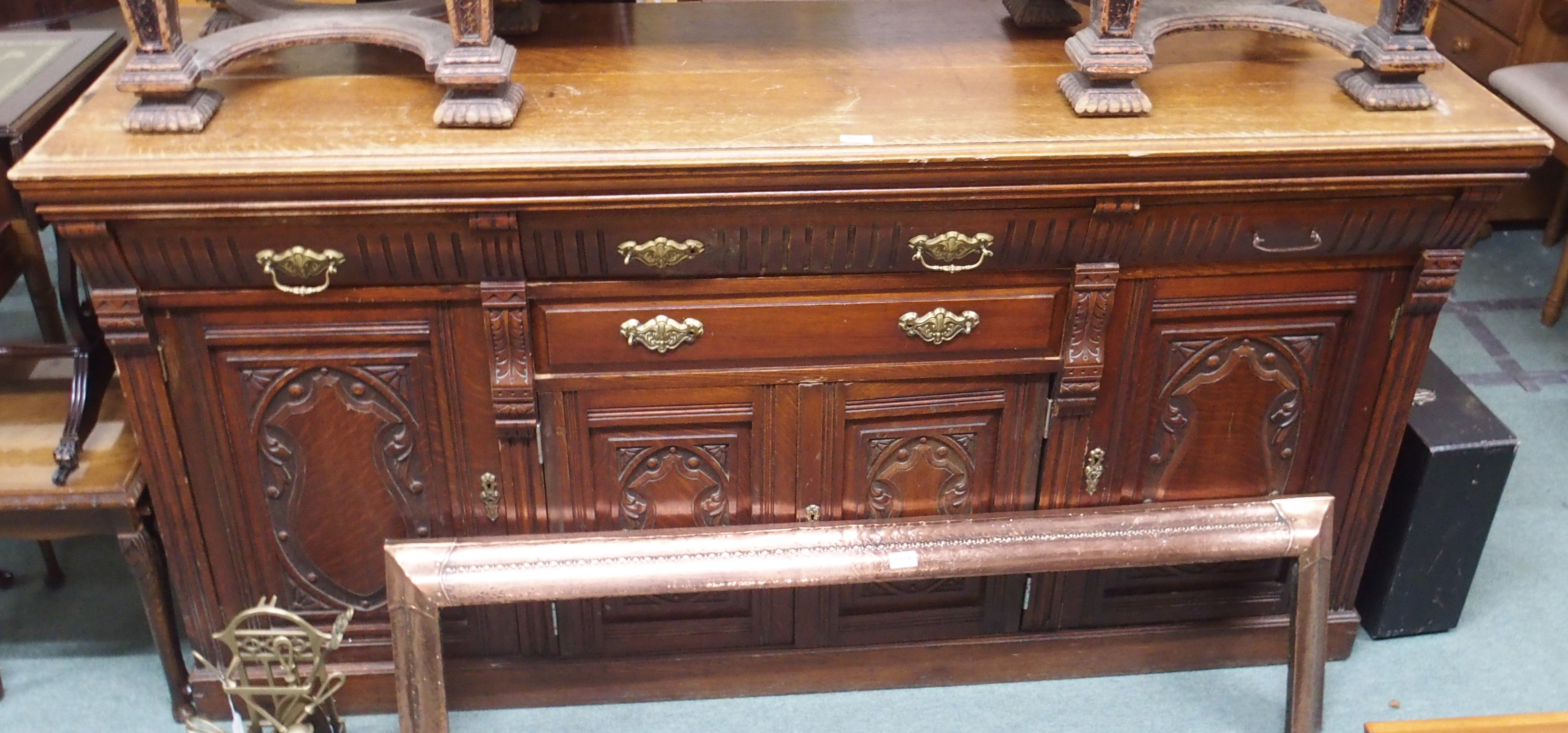 A large oak carved sideboard Condition Report: