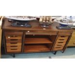 A mid-Century Abbess Linear office desk with tambour front Condition Report: Available upon request