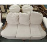 A Bergere three piece suite comprising three seater sofa and two chairs (3)