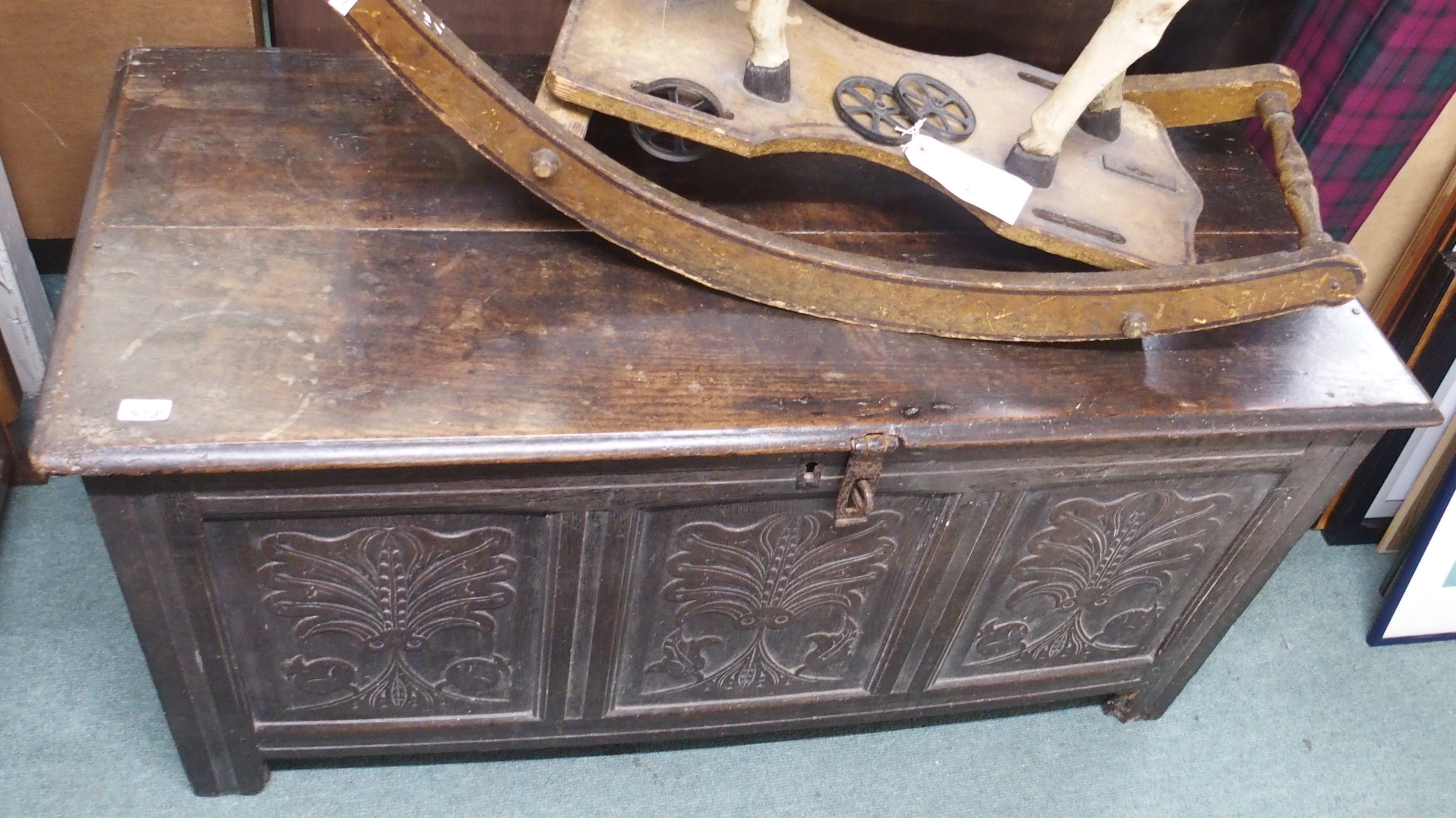 An 18th Century coffer with carved panels Condition Report: Available upon request