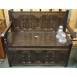 A carved oak hall bench Condition Report: Available upon request