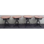 Four circular tables with cast iron bases (4) Condition Report: Available upon request