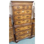 A walnut chest on chest on bracket feet Condition Report: Available upon request