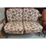An Ercol two seater sofa Condition Report: Available upon request