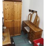 A pine wardrobe, dressing table and stool (3) Condition Report: Available upon request