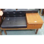 A mid-Century teak telephone table Condition Report: Available upon request
