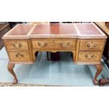 A reproduction walnut writing desk Condition Report: Available upon request