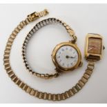 A 9ct vintage ladies watch head weight including mechanism and strap 23.5gms and an 18ct gold