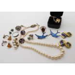 A silver and enamel double swallows brooch, and a collection of silver and costume jewellery