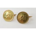 A pair of USA one dollar coins made into earrings with soldered on yellow metal ear fittings, weight