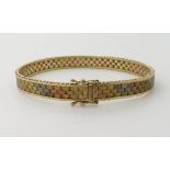 A three colour gold woven bracelet length 18cm, weight 13.6gms Condition Report: Light general wear.