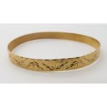 A 9ct gold bangle inner diameter approx 7cm, weight 15.6gms Condition Report: Available upon