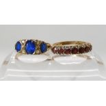 A 9ct gold blue and clear gem set ring size N, together with a 9ct garnet ring, size O, weight