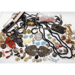 A collection of vintage costume jewellery to include, a chick trinket box, fob chains, beads