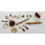 A gold plated enamelled propelling pencil, an monogrammed carved citrine and other items Condition