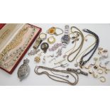 A silver and marcasite watch, silver chains and a quantity of costume jewellery Condition Report: