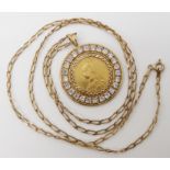 An 1889 gold full sovereign in gem set 9ct pendant mount with chain length 66cm, combined weight