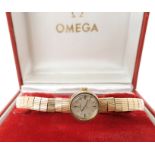 A 9ct gold ladies Omega wristwatch, diameter of the dial 14mm, length of the strap 17.5cm, weight