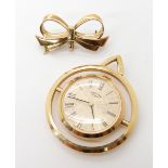 A 9ct gold bow brooch, weight 3.3gms with an attached Rotary pendant watch Condition Report: